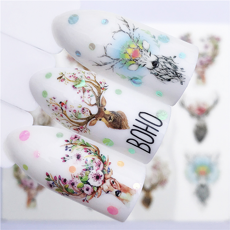 creature nail tattoos